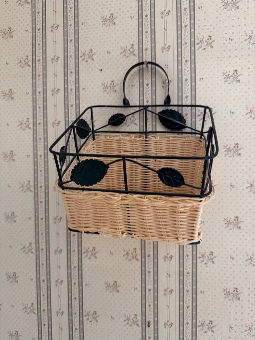 Woven Rattan Hanging Basket with Black Metal Leaf Frame